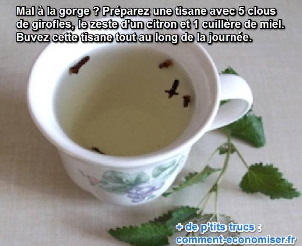 Une tasse de tisane avec des clous de girofle dedans