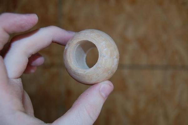 la rondelle de bois est évidée