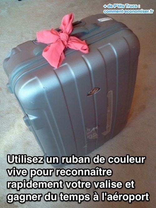 accrocher un fouloir à sa valise pour la reconnaître tout de suite