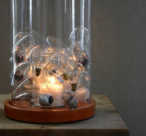 mettre les ampoules dans un présentoir en verre