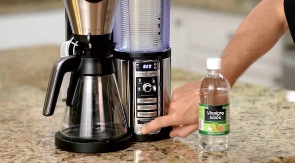 Use white vinegar to clean the coffee machine