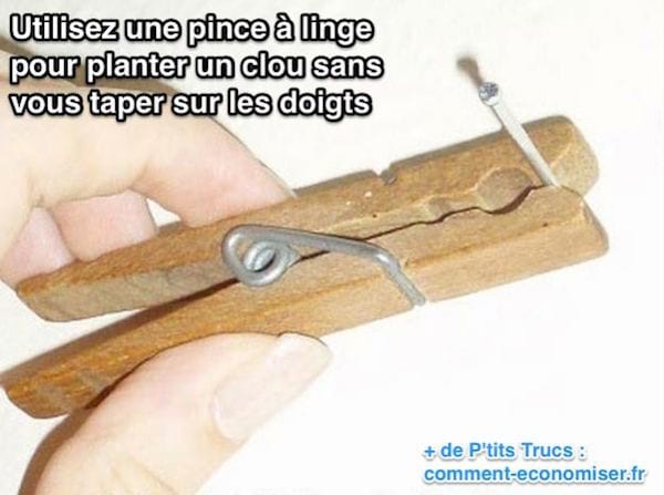 Utilisez une pince à linge  pour planter un clou sans  se taper sur les doigts