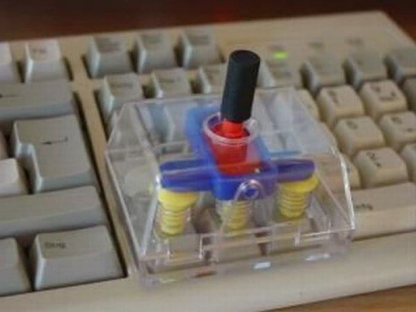 Joysticks à poser sur les flèches du clavier pour déplacer le curseur facilement