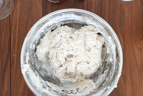 homemade bread dough in a container