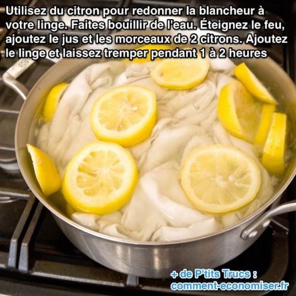 une casserole avec des citron et du linge qui bouillent dans l'eau pour faire blanchir le linge