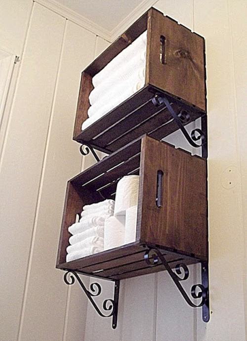 wall storage for the bathroom made with wooden crates