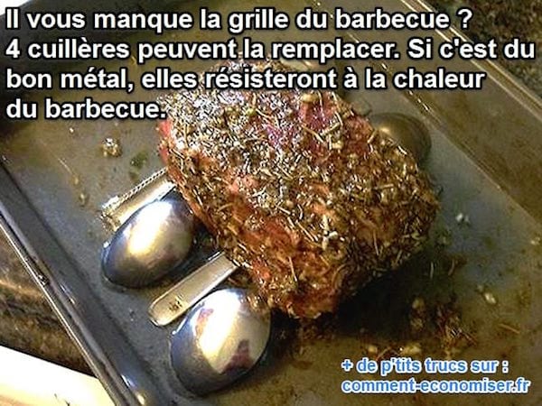 des cuillères en métal remplacent la grille d'un barbecue