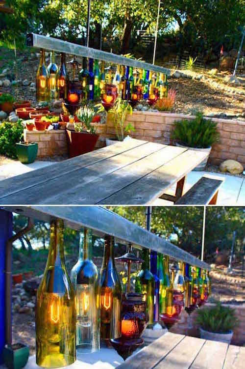 des bouteilles de vin ont été transformées en lanterne pour un éclairage exterieur