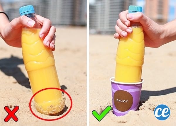 une bouteille mise dans un gobelet pour éviter que le sable colle à la bouteille