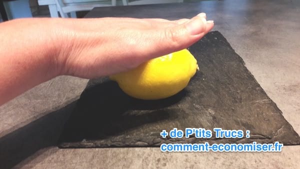 roll the lemon under your hand 