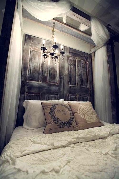 Upcycling idea: two old doors recycled at the headboard with canopies.