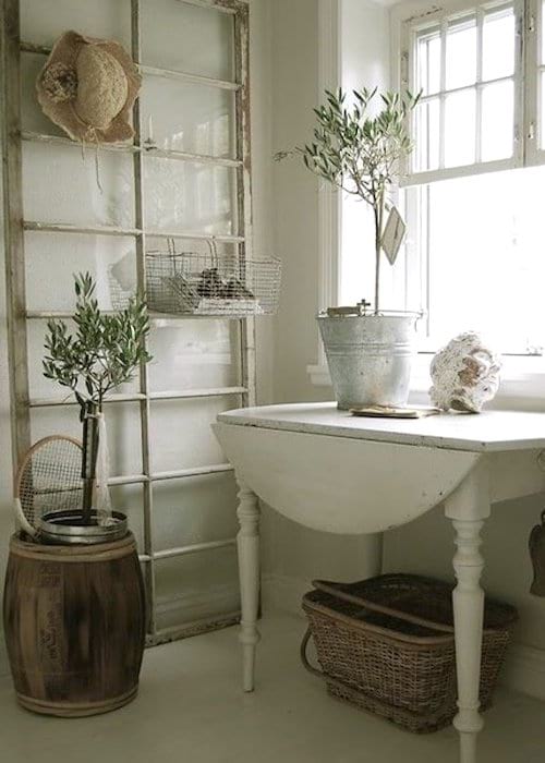 Upcycling idea: an old window recycled into a towel rack for the bathroom.