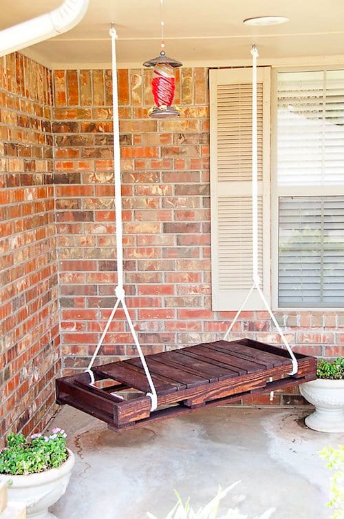 Upcycling idea: an old window recycled into a hanging swing.