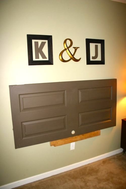 Upcycling idea: an old door recycled into a wall decoration.