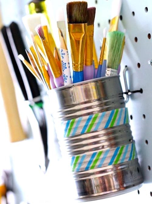 Utilisez des vieilles boîtes de conserve pour gagner de la place dans votre garage.