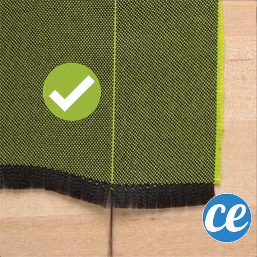 Astuce de couture : utilisez une pince à épiler pour tracer une ligne sur un morceau de tissu.