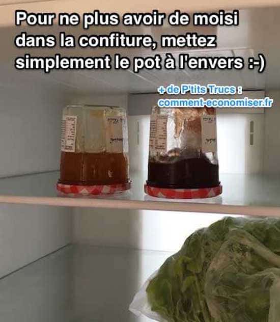 les pots de confiture sont mis à l'envers dans le frigo