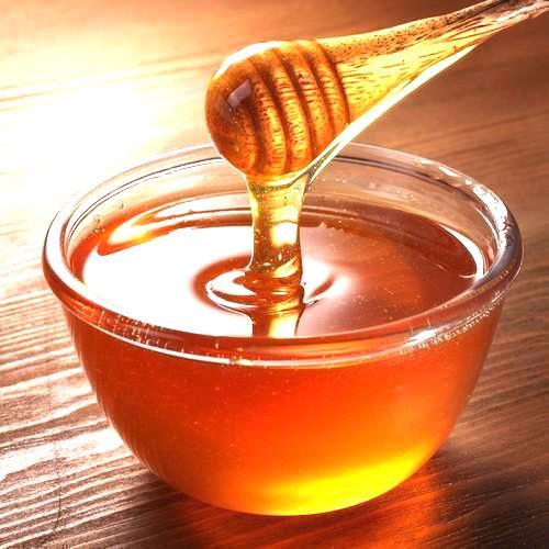Grandma's trick for measuring sticky ingredients: moisten the container with a little water!