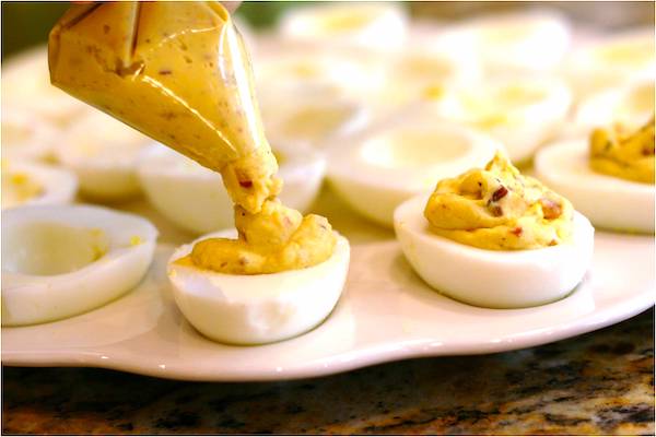 Grandma's tip for making deviled eggs is to use a freezer bag as a piping bag.