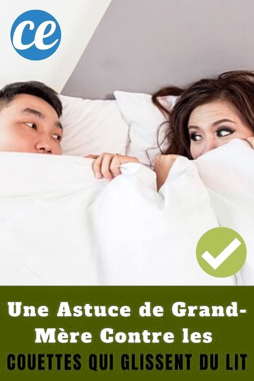 Un couple se regardant dans les yeux sous une couette blanche