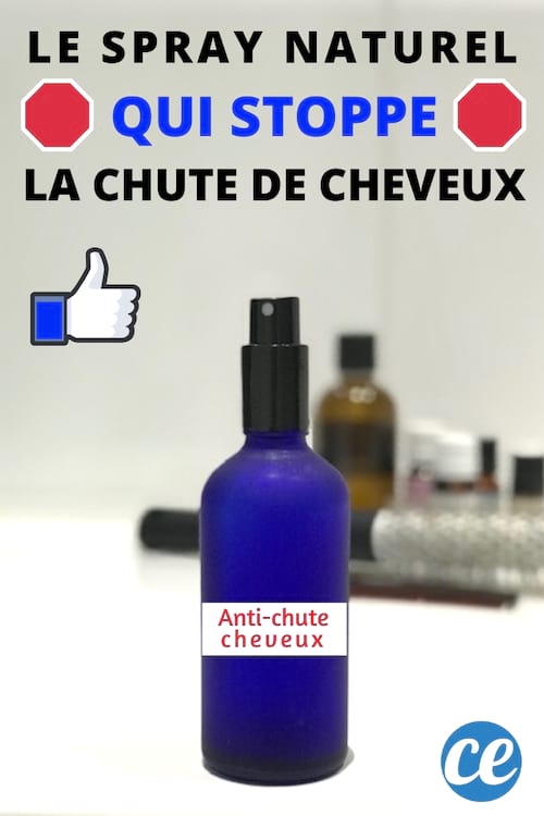 flacon bleu de traitement anti-chute pour cheveux avec brosse à cheveux et huiles essentielles en arrière plan