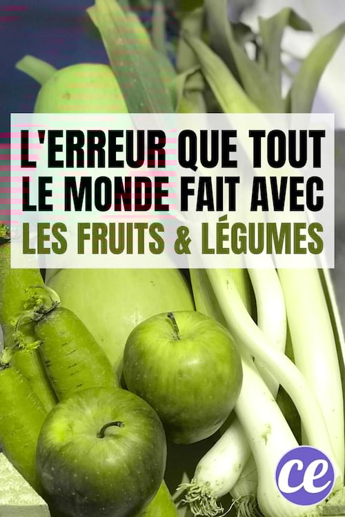 Une cagette avec des poireaux, carottes, pomme et courge buternut
