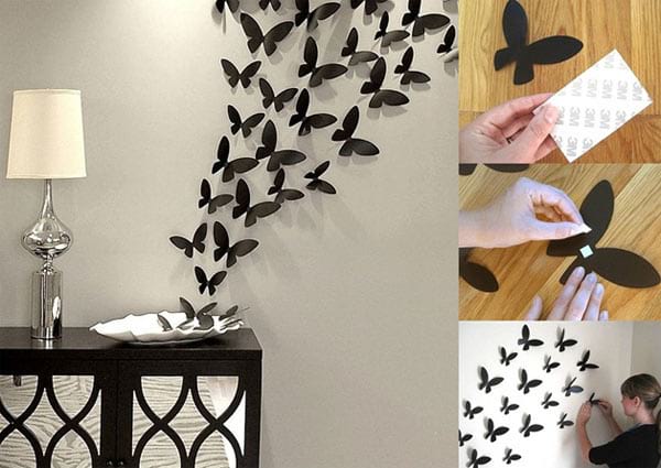 Several black butterflies on the wall as decoration 