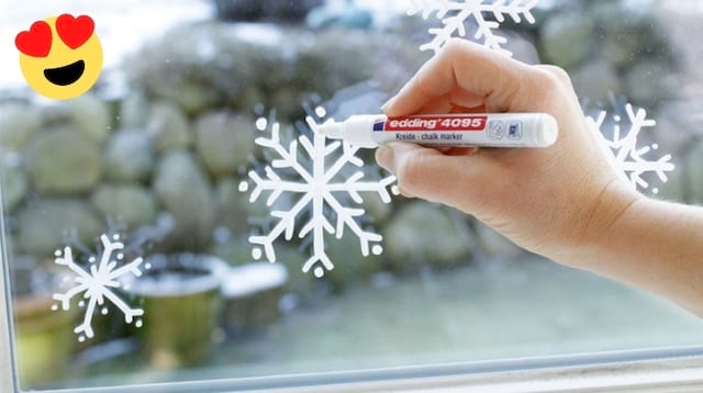 Um marcador para desenhar flocos de neve na janela