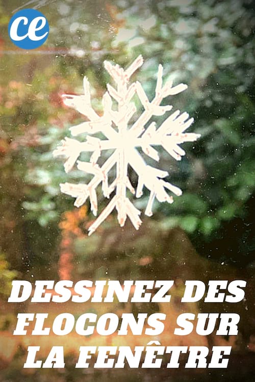 Un flocon de neige dessiner sur la fenêtre avec un marqueurr