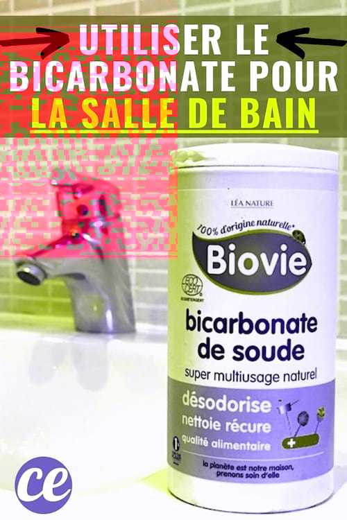 Une boîte de bicarbonate posé sur lavabo devant un robinet propre