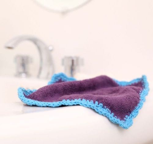 Gant de toilette violet 