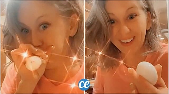 Une femme qui souffle sur un oeuf dur pour retirer la coquille