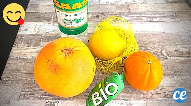 Du vinaigre blanc avec des citrons et oranges pour faire du vinaigre aromatisé