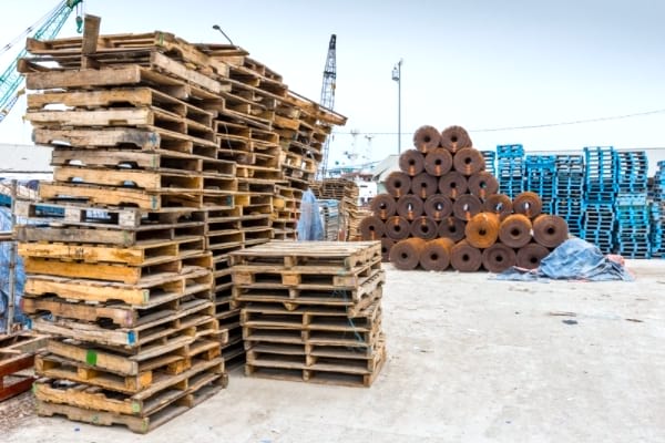Industrial areas to find free wooden pallets.