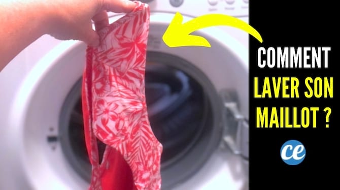 Un maillot de bain rose devant la porte d'une machine à laver