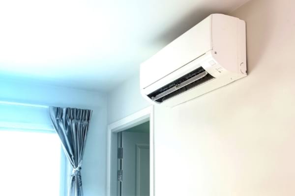 A wall-mounted air conditioner that consumes a lot of electricity