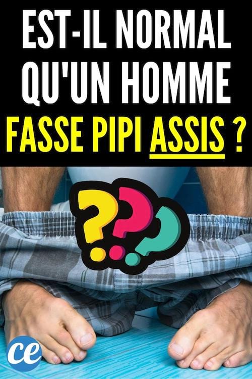 Un homme assis sur les toilettes.