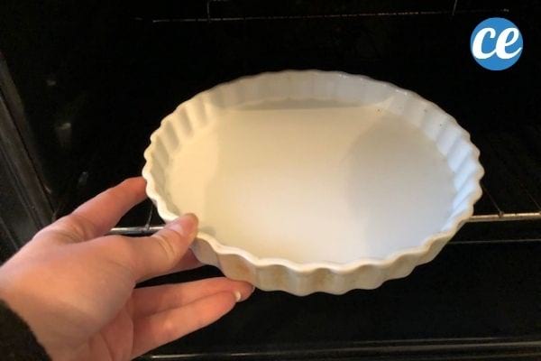 white pie dish in an oven