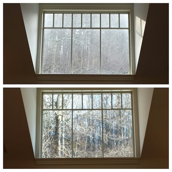 Des vitres très sales qui sont nettoyées avec un karcher pour être propres