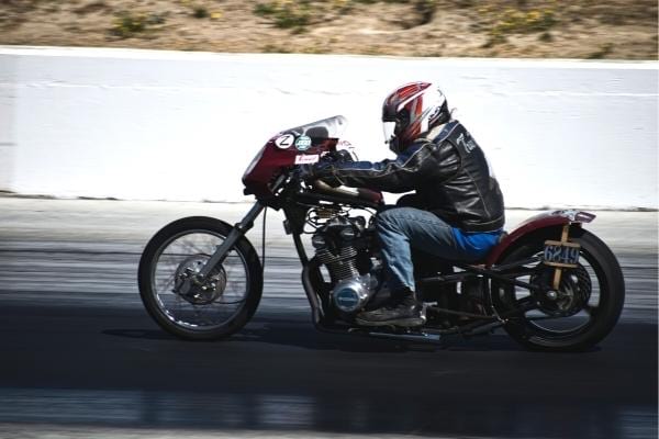 A biker who drives aerodynamically to save fuel