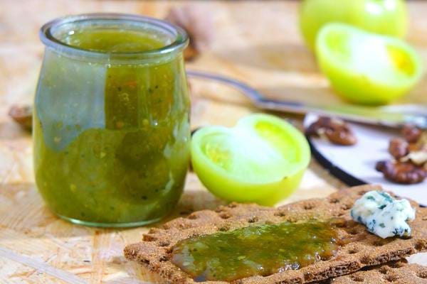 A jam in a glass jar made with green tomatoes 