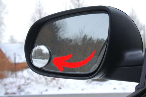 small round mirror on a car rear view mirror