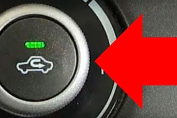 A car button with a green light
