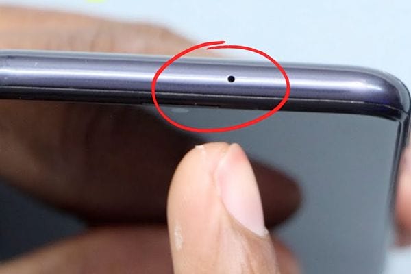 A small hole on a black phone 