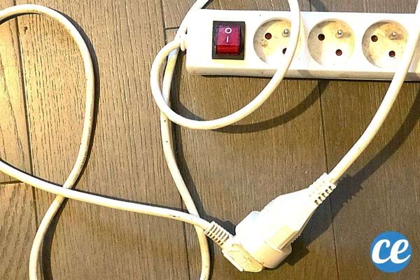 Power strip plugged into an extension cord 