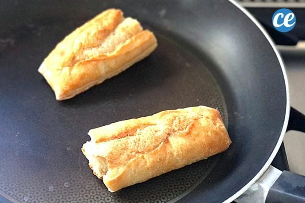 Two pieces of baguette in a pan