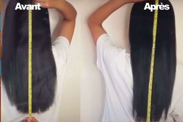 Une femme mesure la longueur de ses cheveux après avoir utilisé l'eau de riz