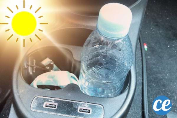 soleil qui chauffe une bouteille en plastique dans la voiture
