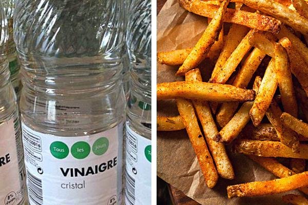 Une bouteille de vinaigre blanc avec des frites