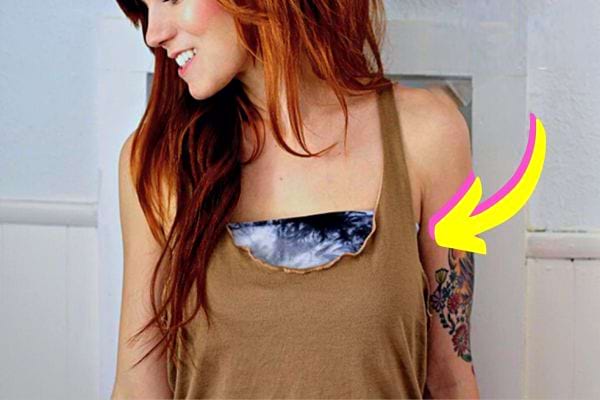 Top avec poche poitrine réutilisée d'un legging, indiquée par une flèche.